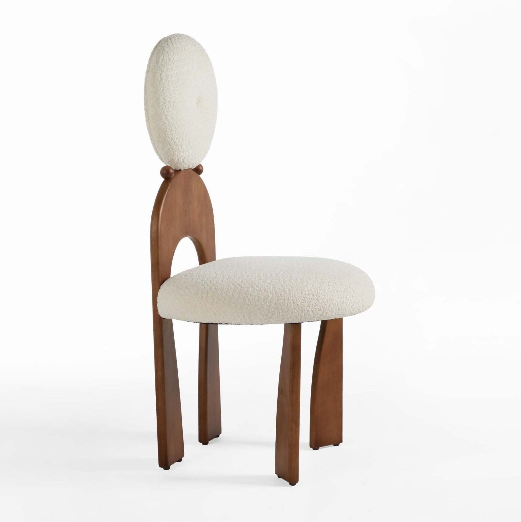 A dining chair with a solid rubber wood frame and a round white upholstered seat and backrest.