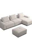cream white sectional sofa with ottoman on a white background