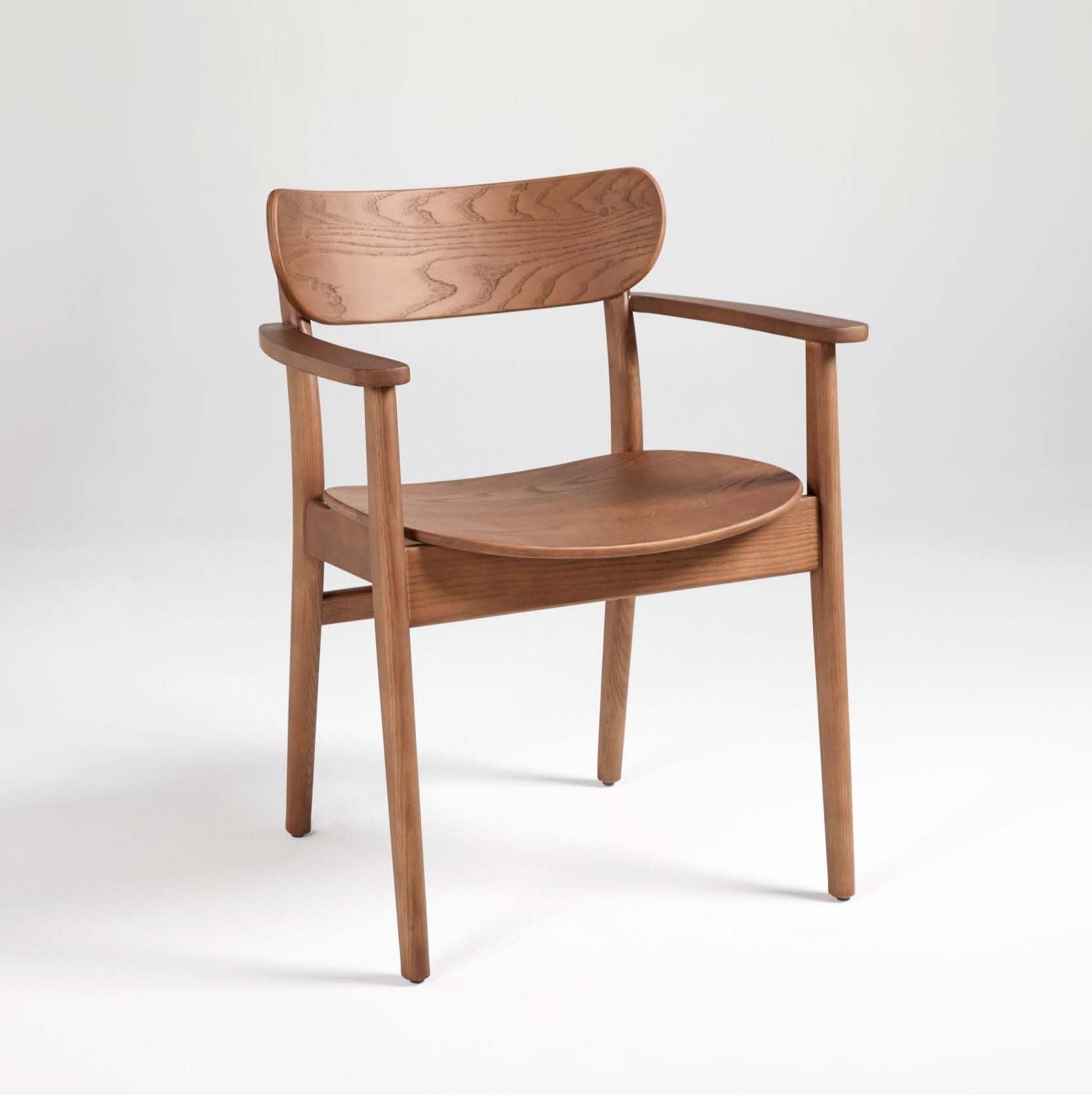 A brown dining chair made of solid ash wood, with a full back and armrests.