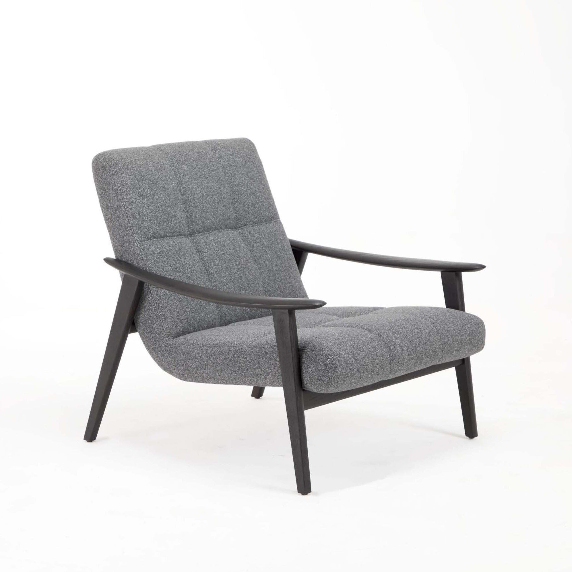 A gray upholstered Wilo armchair with a solid ash wood frame and seat cushion.